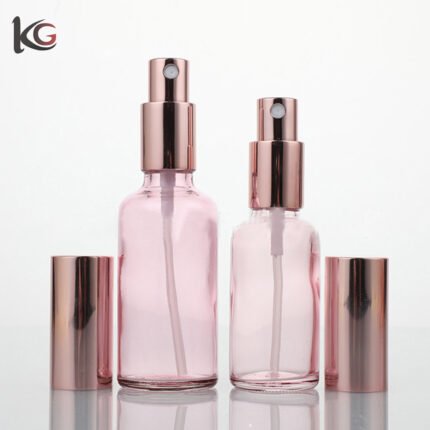 Wholesale 30ml & 50ml pink glass spray bottles for cosmetics, perfumes, and essential oils; press-type spray dispensers, portable.